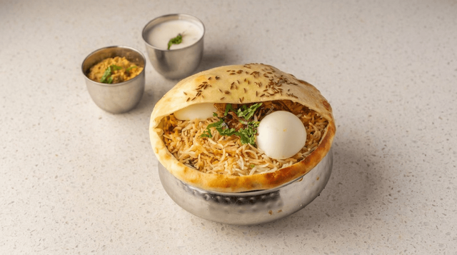 Hyderabadi Chicken Dum Biryani.